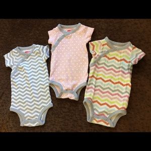 Skip Hop newborn onesies never worn.